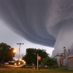 A huge funnel cloud touches down in Orchard, Iowa, on June 10, 2008