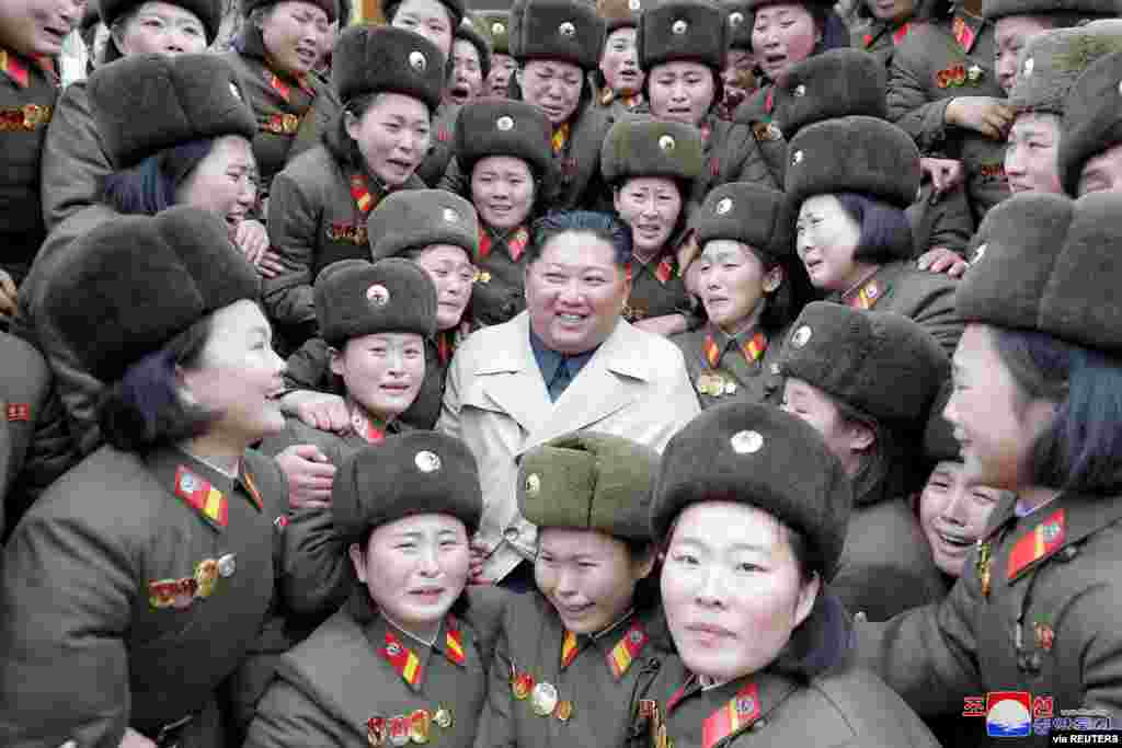 North Korean leader Kim Jong Un inspects a women company belonging to 5492 troops, in this undated picture released by North Korea's Central News Agency (KCNA).