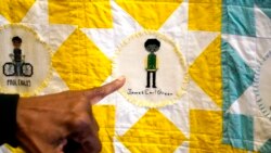 A portrait of the late civil rights activist Medgar Evers is among the 116 cross-stitched images adorning one of two hand crafted quilts honoring African-Americans who lost their lives to racial violence.