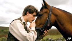 Albert (Jeremy Irvine) and his horse Joey are pictured in this scene from DreamWorks Pictures "War Horse"