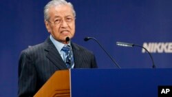 Malaysian Prime Minister Mahathir Mohamad delivers a speech during the International Conference on "The Future of Asia" in Tokyo, June 11, 2018.