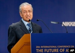 Malaysian Prime Minister Mahathir Mohamad delivers a speech during the International Conference on "The Future of Asia" in Tokyo, June 11, 2018.