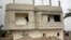 A broken and deserted house, which has a tunnel running underground, is seen in the Egyptian border city of Rafah, May 13, 2013. The house was destroyed due to the construction of the tunnel used for smuggling things from Egypt into Gaza. 
