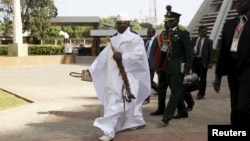 Gambia's President Yahya Jammeh arrives to the opening of the 48th ordinary session of ECOWAS Authority of Head of States and Government in Abuja, Nigeria, Dec. 16, 2015. Gambia ordered female government employees to wear headscarves at work on Jan. 5, 2016, one month after President Yahya Jammeh declared it an Islamic republic.