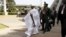 Gambia's President Yahya Jammeh arrives to the opening of the 48th ordinary session of ECOWAS Authority of Head of States and Government in Abuja, Nigeria, Dec. 16, 2015. Gambia ordered female government employees to wear headscarves at work on Jan. 5, 2016, one month after President Yahya Jammeh declared it an Islamic republic.