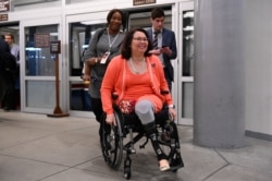 U.S. Senator Tammy Duckworth (D-IL) arrives for the fourth day of the Senate impeachment trial of U.S. President Donald Trump at the U.S. Capitol in Washington, U.S., January 24, 2020. REUTERS/Erin Scott