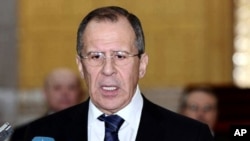 In this photo released by the Syrian official news agency SANA, Russian Foreign Minister Sergey Lavrov, speaks to reporters after his meeting with Syrian President Bashar Assad, at the presidential palace, in Damascus, Syria, February 7, 2012.