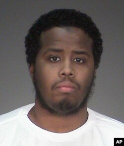 This undated file photo provided by the Washington County Sheriff's Office in Stillwater, Minn., shows Mohamed Abdihamid Farah, one of several Minnesota men facing trial for allegedly plotting to join the Islamic State group.