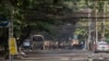 Tentara dan polisi berkumpul saat demonstrasi menentang kudeta militer di Kyauk Myaung Township, Yangon, Myanmar, Sabtu, 3 April 2021. (Foto:AP)