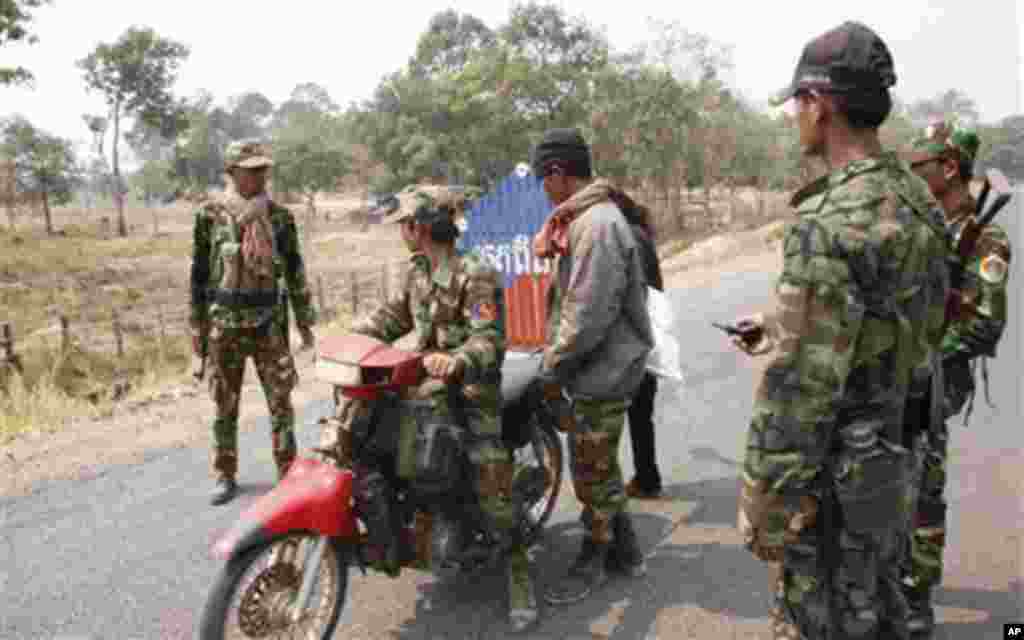 Cambodian army soldiers man a checkpoint near Cambodia's famed Preah Vihear temple, a UNESCO World Heritage site, in Preah Vihear province.