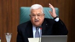 The new Palestinian government gets a wary greeting.