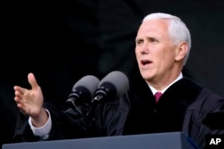 FILE - Vice President Michael Pence speaks at the commencement ceremony at Grove City College, May 20, 2017, in Grove City, Pennsylvania.