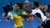 Australia's Ellia Green, left, breaks away from Fiji's Raijieli Daveua during a women's rugby sevens match at the Summer Olympics in Rio de Janeiro, Brazil, Aug. 6, 2016.