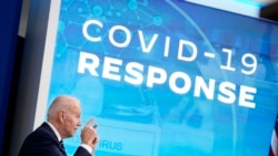 President Joe Biden speaks about the government's COVID-19 response, in the South Court Auditorium in the Eisenhower Executive Office Building on the White House Campus in Washington, Jan. 13, 2022.