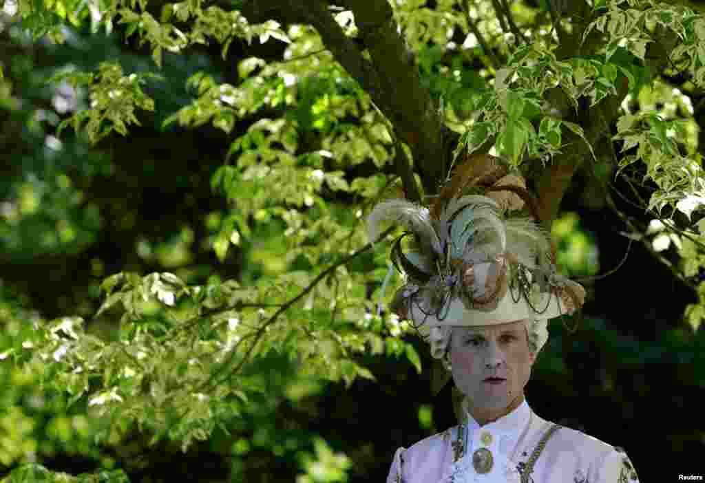 A reveler attends the Victorian Picnic during the Wave and Goth festival in Leipzig, Germany.