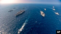 Hàng không mẫu hạm tham gia tập trận hải quân chung Malabar của Bộ tứ an ninh Mỹ, Úc, Nhật và Ấn Độ trên biển hồi tháng 11/2020. 