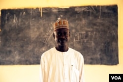 Baba Goni Ibrahim has been teaching science at an all-girls high school in Maiduguri, Nigeria, for the past 20 years, Oct. 5, 2016. (C. Oduah)