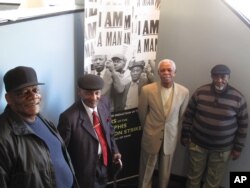FILE - Alvin Turner, the Rev. Leslie Moore, Elmore Nickleberry and Baxter Leach, from left, pose for a photo at the headquarters of Local 1733 of the American Federation of State, County and Municipal Employees on March 14, 2013 in Memphis.