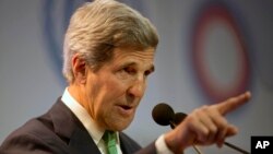 FILE - United States Secretary of State John Kerry delivers a speech at the U.N. Climate Change Conference in Lima, Peru.