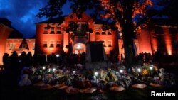 A makeshift memorial grows on the grounds of the former Kamloops Indian Residential School after the remains of 215 children, some as young as three years old, were found at the site in Kamloops, British Columbia, Canada June 5, 2021. REUTERS/Jennifer Gauthier