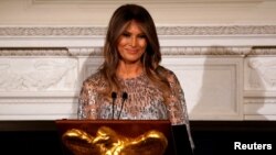 U.S. first lady Melania Trump speaks as she and President Donald Trump host the White House Historical Association reception and dinner at the White House in Washington, Sept. 14, 2017.