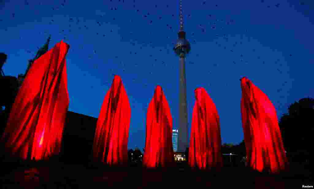 The area around the TV tower is illuminated during the Festival of Lights show in Berlin, Germany.