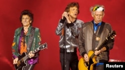 FILE - Ron Wood, Mick Jagger (C) and Keith Richards of the Rolling Stones performs during the band's first concert of the 'No Filter' European tour, at the Stadtpark in Hamburg, Germany, Sept. 9, 2017.