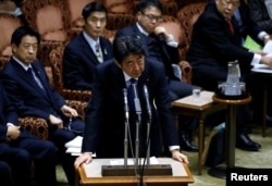 Japan's Prime Minister Shinzo Abe speaks addresses an upper house parliamentary session after reports on North Korea's missile launches, in Tokyo, March 6, 2017.