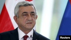 FILE - Armenia's President Serzh Sargsyan speaks during a news briefing in Tbilisi, Georgia, Oct. 30, 2015. 