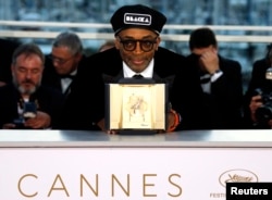 FILE - Spike Lee, director of the film "BlacKkKlansman," poses after the closing ceremony of the 71st Cannes Film Festival, Cannes, France, May 19, 2018.