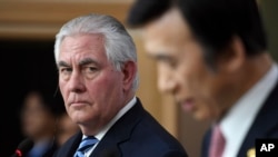 FILE - U.S. Secretary of State Rex Tillerson looks on as South Korean Foreign Minister Yun Byung-se speaks during a press conference in Seoul, March 17, 2017.