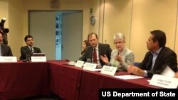 Assistant Secretary of State Kerri-Ann Jones (center right) and members of the the Chilean-American Chamber of Commerce discussed the environment in Santiago, Chile.