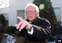 Democratic presidential candidate Sen. Bernie Sanders speaks to reporters at the White House in Washington, Jan. 27, 2016, following a meeting with President Obama.