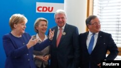 German Chancellor Angela Merkel, German Defence Minister Ursula von der Leyen, Volker Bouffier and Armin Laschet, Minister President of North Rhine-Westphalia attend a Christian Democratic Union (CDU) leadership meeting in Berlin, Germany, Oct. 15, 2018. 