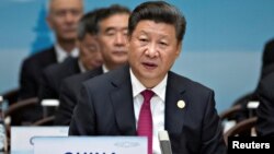 Presiden China Xi Jinping memberikan pidato pada pembukaan KTT G20 di Hangzhou, Zhejiang, China hari Minggu (4/9). 