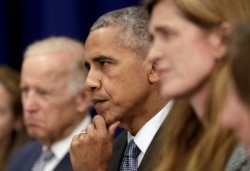 FILE - President Barack Obama, center, Vice President Joe Biden, left, and United States United Nations Ambassador Samantha Power attend a meeting at the Lotte New York Palace Hotel in New York, N.Y., Sept. 19, 2016.