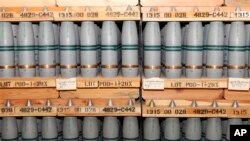 FILE - This Jan. 21, 2010, file photo shows 105mm shells containing mustard agent that are stored in a bunker at the Army's Pueblo Chemical Storage facility in Pueblo, Colo. 