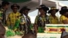 UMongameli Robert Mugabe lemmuli yakhe emkhosini wokunanza ilanga lakhe lokuzalwa eMatopo Junior School, Matabeleland South province.