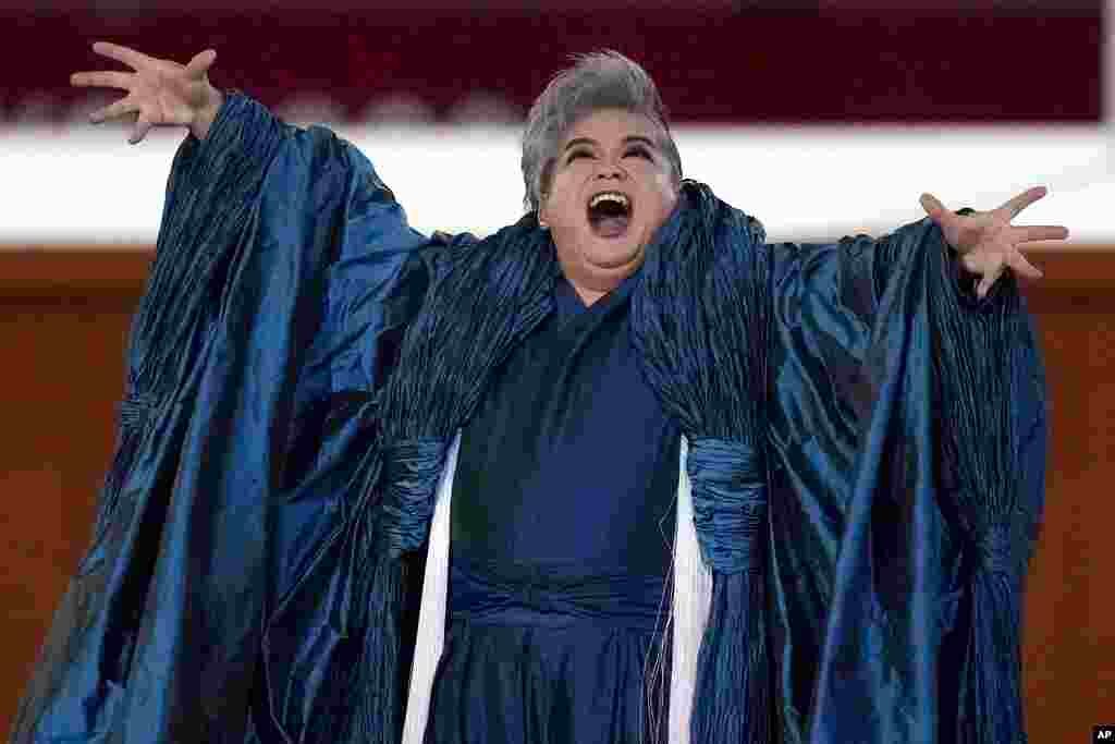 Tomotaka Okamoto performs during the closing ceremony in the Olympic Stadium at the 2020 Summer Olympics, Sunday, Aug. 8, 2021, in Tokyo, Japan. (AP Photo/Charlie Riedel)