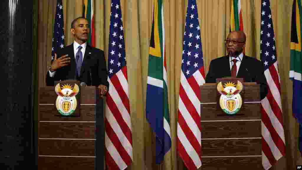 U.S. President Barack Obama and South African President Jacob Zuma address a press conference following their meeting at Union Building in Pretoria, South Africa, June 29, 2013.