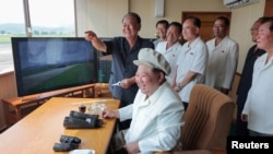 FILE - North Korean leader Kim Jong Un oversees a performance test of drones during a visit to the Drone Institute of North Korea's Academy of Defense Sciences, August 24, 2024, in this photo released by North Korea's official Korean Central News Agency.