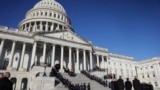 The U.S. flag flies at half-staff at the Capitol during the funeral of former President Jimmy Carter on Jan. 9, 2025. Mike Johnson, speaker of the House of Representatives, on Jan. 14 ordered flags at the Capitol to be flown at full height on Inauguration Day.