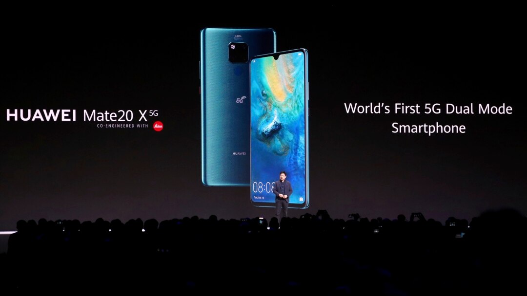 FILE - Richard Yu, CEO of the Huawei consumer business group, presents new devices during an event in Munich, Germany, Sept. 19, 2019.