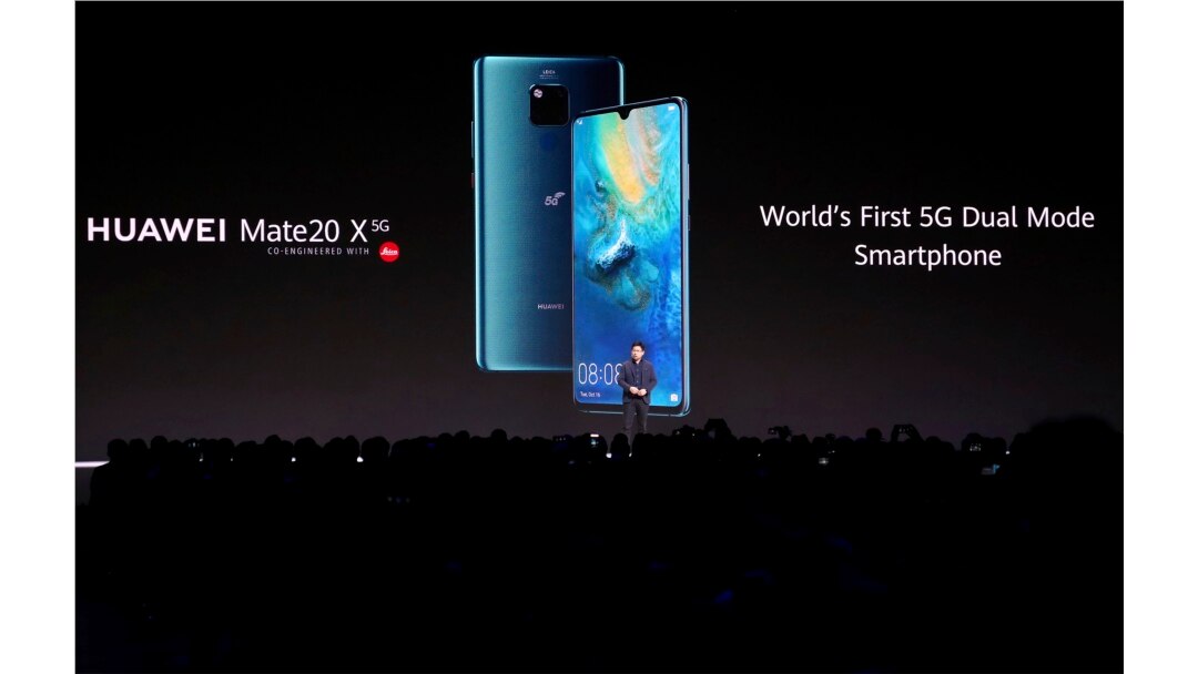 FILE - Richard Yu, CEO of the Huawei consumer business group, presents new devices during an event in Munich, Germany, Sept. 19, 2019.