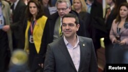 Greek Prime Minister Alexis Tsipras gives a statement after a European Union leaders summit in Brussels, March 20, 2015. 