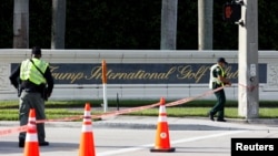 Law enforcement officers work after reports of shots fired outside Republican presidential nominee and former U.S. President Donald Trump's Trump International Golf Course in West Palm Beach, Florida, Sept. 15, 2024.