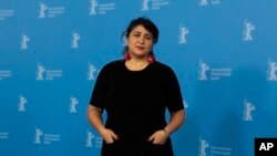 FILE - Director of "Joy" Sudabeh Mortezai poses for photographers at a photo call at the International Film Festival Berlinale in Berlin, Germany, Feb. 14, 2014.