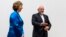 Iranian Foreign Minister Mohammad Javad Zarif (R) gestures next to European Union foreign policy chief Catherine Ashton , Oct. 15, 2013.