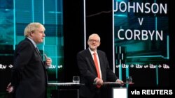 Conservative leader Boris Johnson and Labour leader Jeremy Corbyn are seen during a televised debate ahead of general election in London, Nov. 19, 2019. (Credit: Jonathan Hordle/ITV)