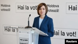 Moldova's incumbent President and presidential candidate Maia Sandu speaks at a press conference in Chisinau, Moldova, Oct. 21, 2024.